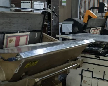 Industrial die cutting machine used in packaging and print finishing production