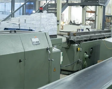 Industrial glue primer machine used for surface preparation in printing and packaging processes