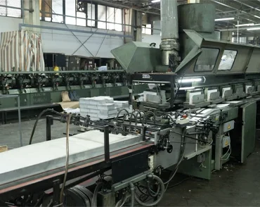 Industrial hot glue machine used for bonding and packaging in printing operations