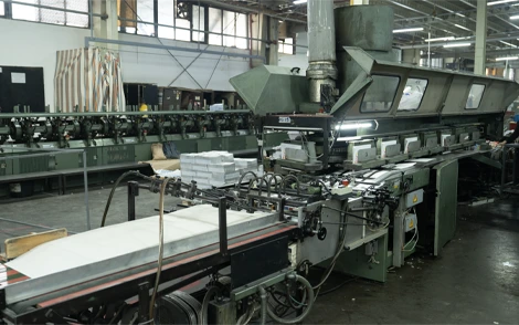 Industrial hot glue machine used for bonding and packaging in printing operations
